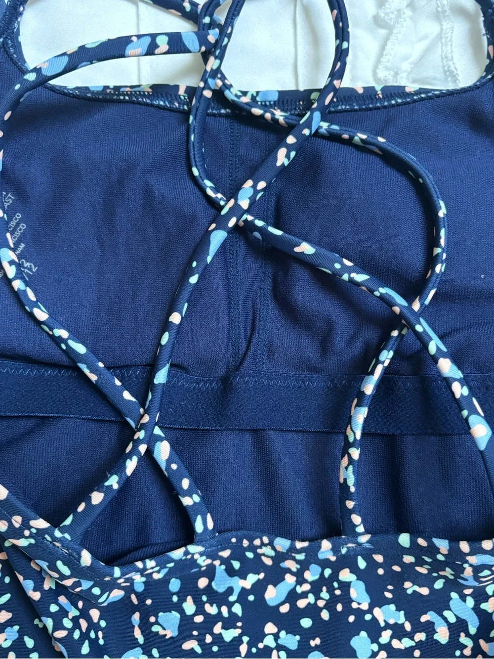 Athleta Girl Two-Piece Tankini with Blue, Green, and Light Pink Speckles